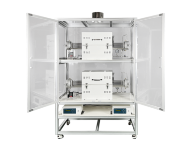 Multiple tube furnaces stacked vertically within a cabinet enclosure.